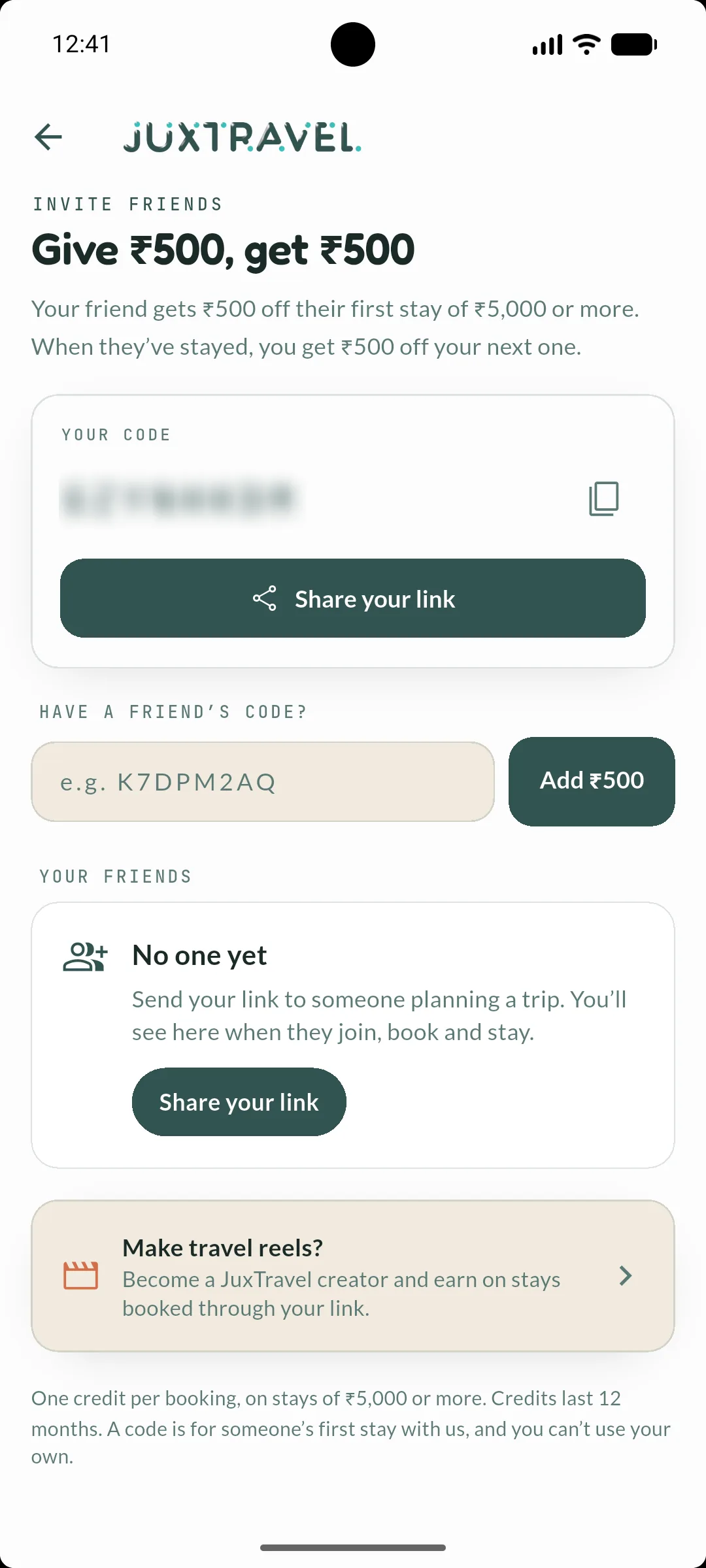 The Invite friends screen in the JuxTravel app: Give ₹500, get ₹500, your code and Share your link